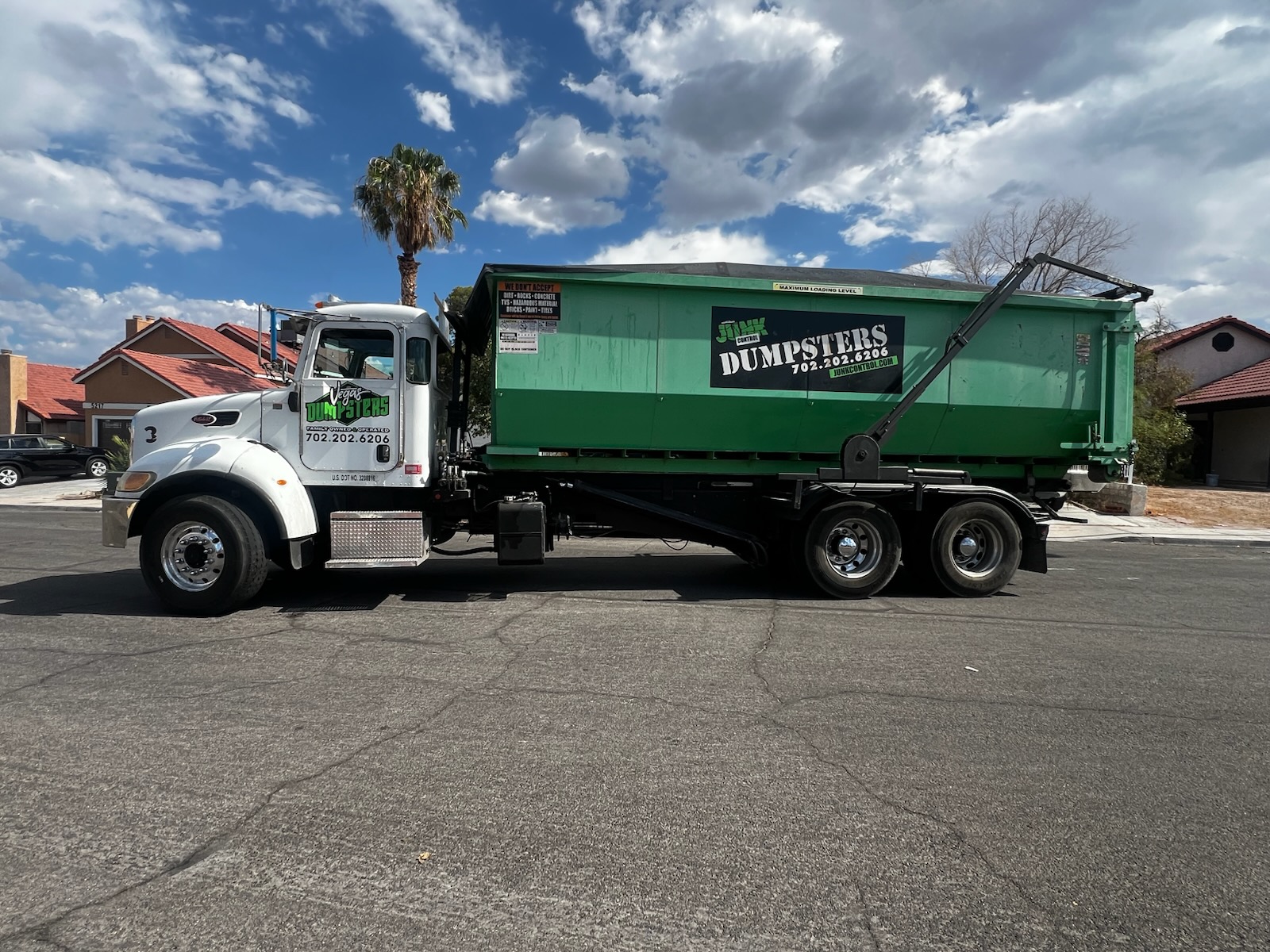 30-yard roll off dumpster rental placed in the driveway of a Green Valley, Henderson home during a residential cleanout project.