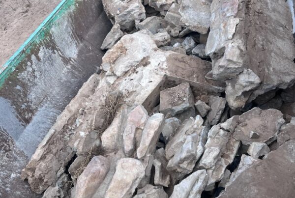 Lowboy dumpster rental in Las Vegas for dirt rock and concrete
