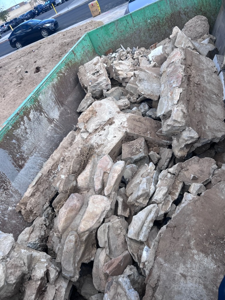 Lowboy dumpster rental in Las Vegas for dirt rock and concrete